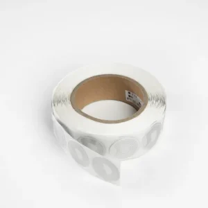 A roll of RF Magnetic 8.2Mhz Stickers designed as transparent adhesive labels with circular patterns on a white background for enhanced functionality.