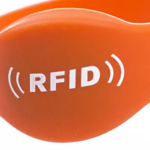 Close-up of an orange RFID Wristbands For Events, featuring the text "RFID" with signal lines on either side.