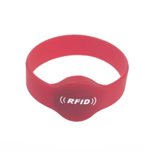 Ցուցադրված է RFID իրադարձության ձեռքի ժապավեն կարմիր գույնով, պարծենալով կենտրոնական պիտակով, որը զարդարված է «RFID" և երկու կոր գծեր, որոնք խորհրդանշում են անլար կապը.